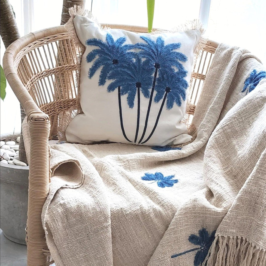 https://suksmafrombali.com/cdn/shop/products/Ariel-Embroidered-Palm-Cushion-Suksma-from-Bali-1664525467.jpg?v=1679274469&width=1445