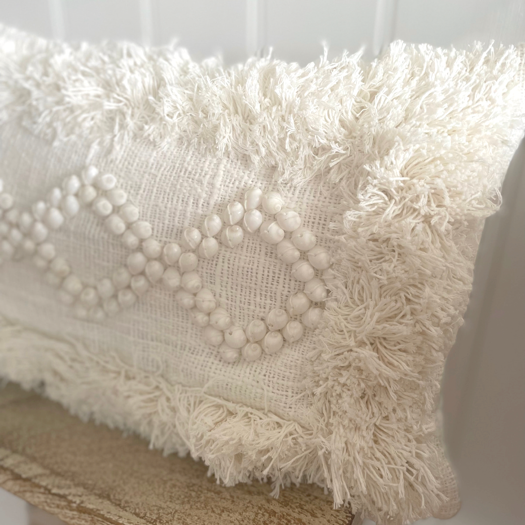 white boho coastal cushion